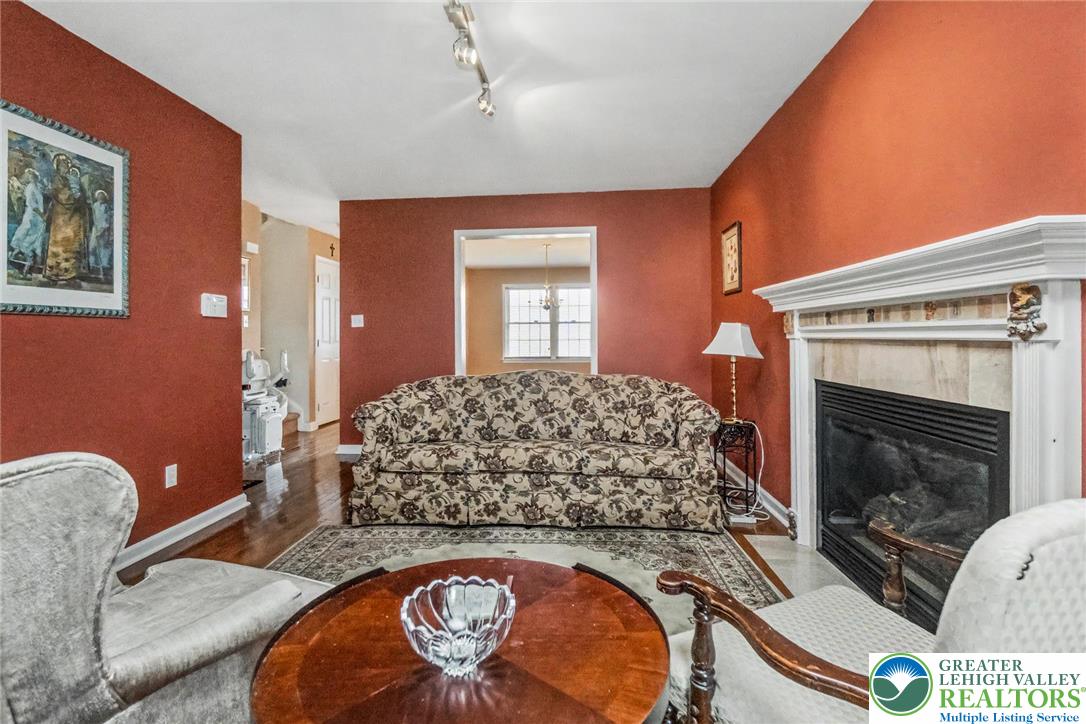 2132 Lexington Avenue Bethlehem, PA 18017 - Photo 8 of 47 a living room with a couch and a fireplace