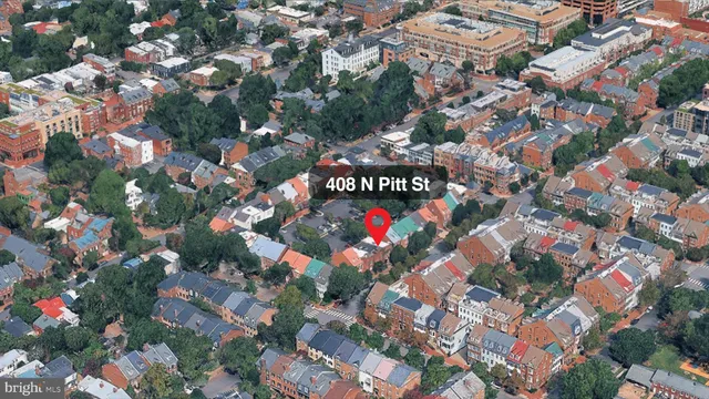 a view of a street with a building in the background