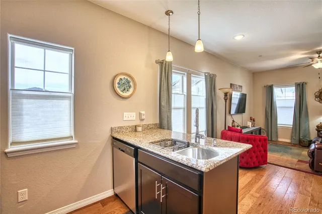 a kitchen with a sink and a window