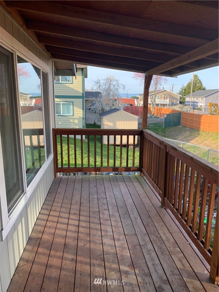1625 Chestnut Street Everett, WA 98201 - Photo 21 of 27 a view of porch with wooden floor in outdoor space