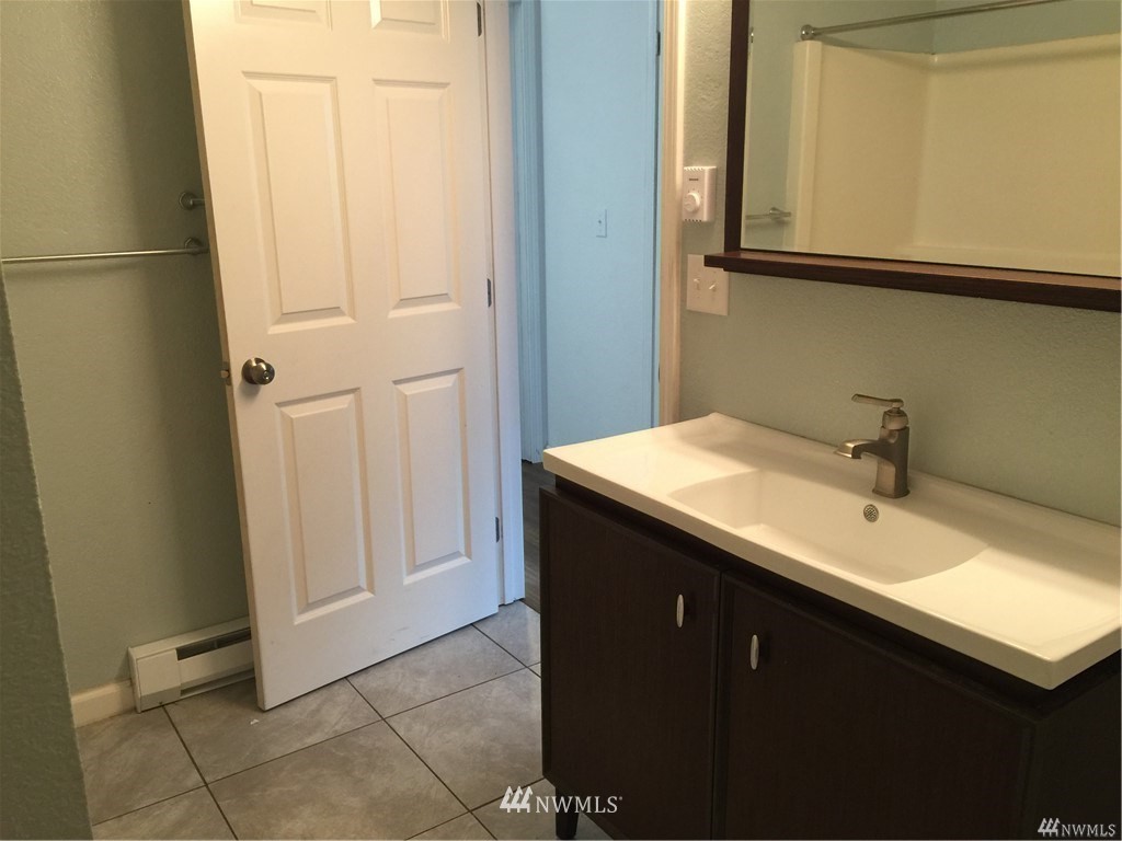 1625 Chestnut Street Everett, WA 98201 - Photo 6 of 27 a bathroom with a sink and a mirror