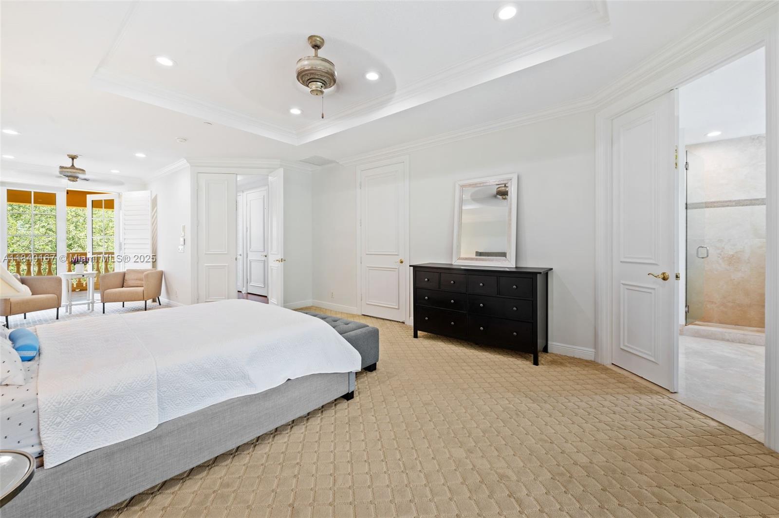 400 Northeast 69th Circle Boca Raton, FL 33487 - Photo 13 of 35 a bed room with a bed and a window