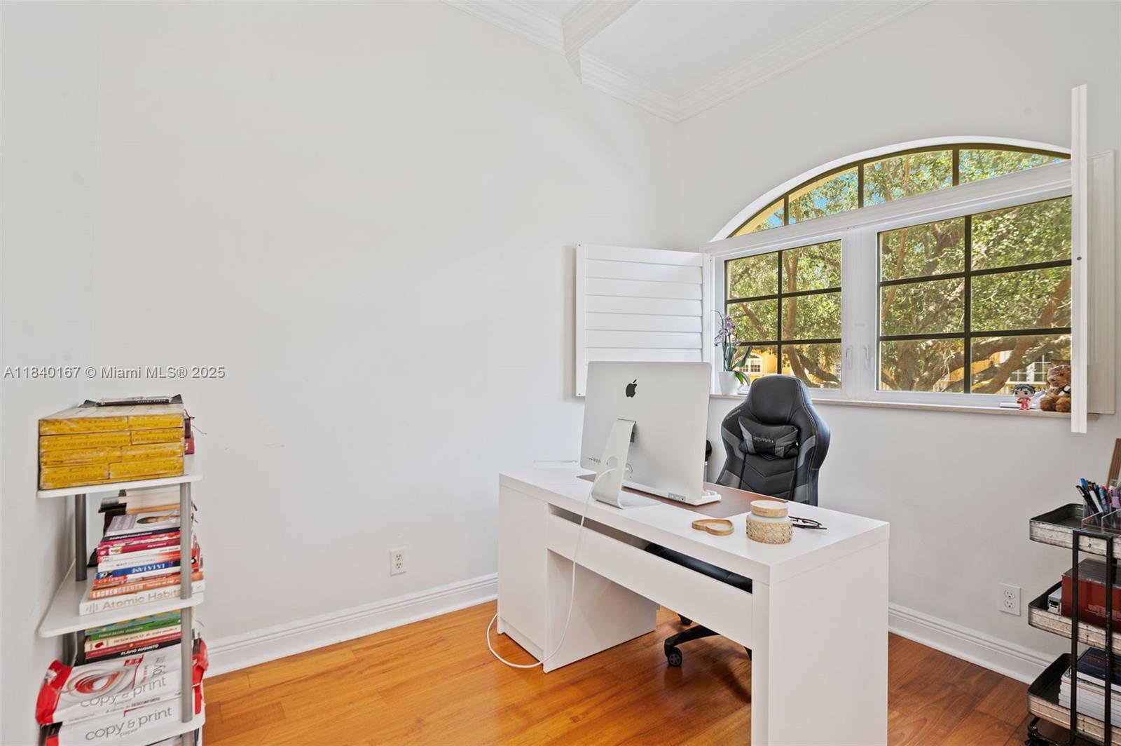 400 Northeast 69th Circle Boca Raton, FL 33487 - Photo 24 of 35 a view of workspace with a window