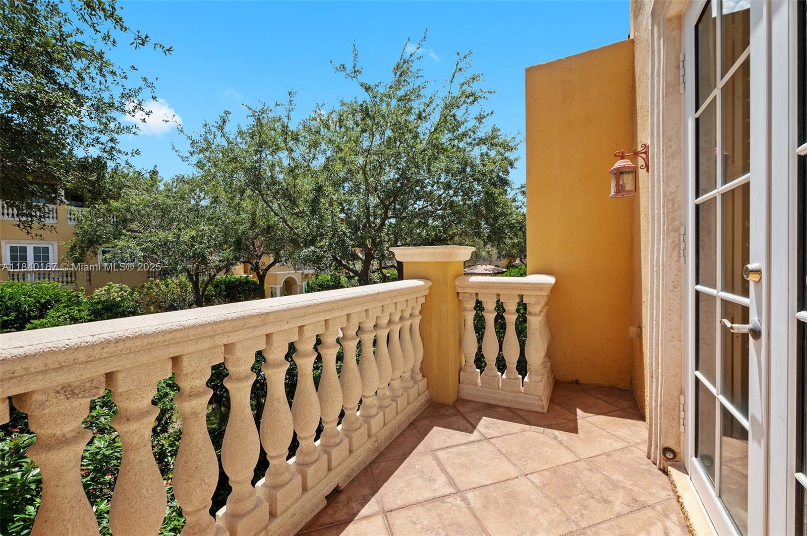 400 Northeast 69th Circle Boca Raton, FL 33487 - Photo 29 of 35 a view of a door with wooden fence
