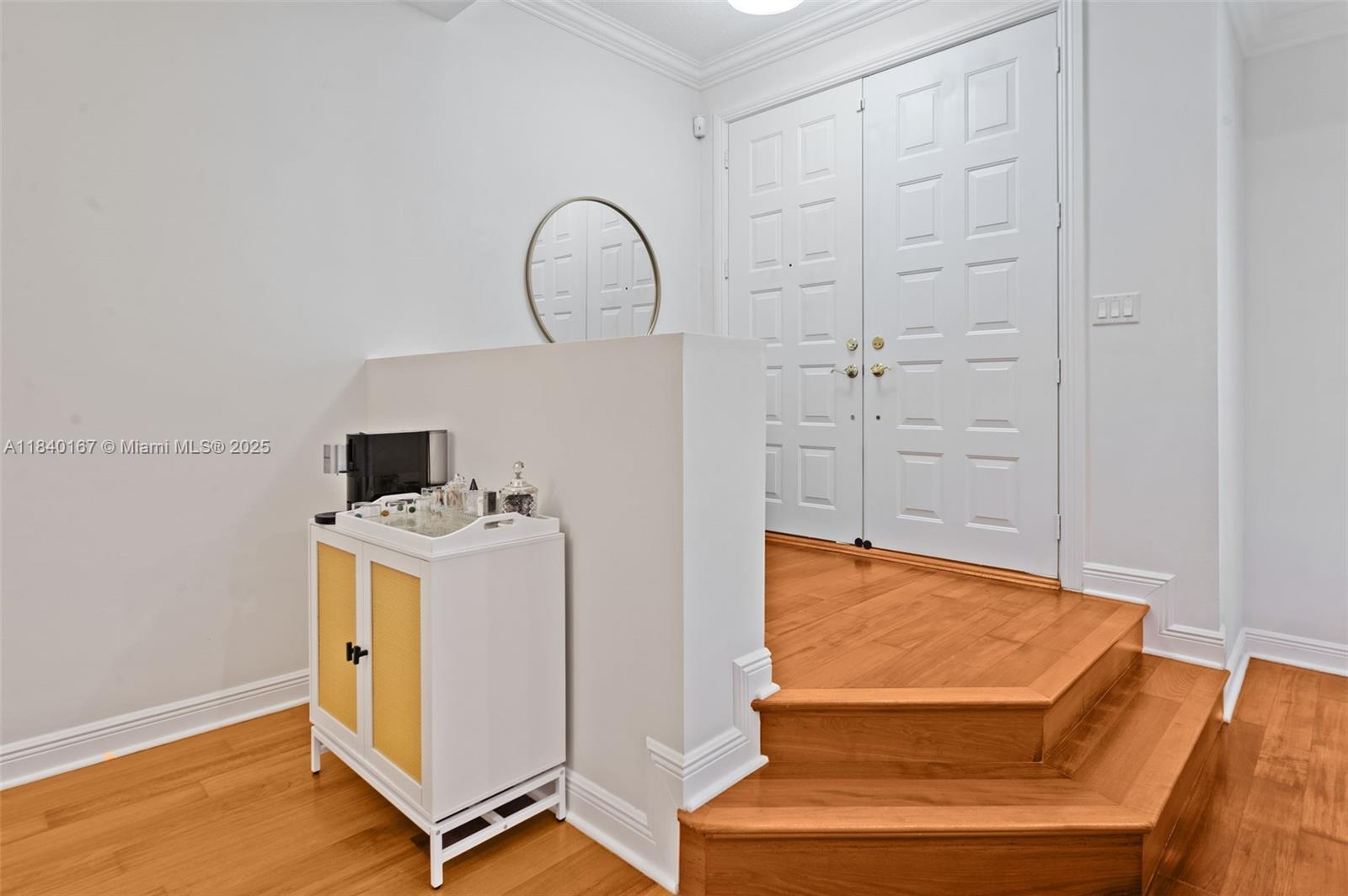 400 Northeast 69th Circle Boca Raton, FL 33487 - Photo 3 of 35 a view of washer and dryer with wooden floor