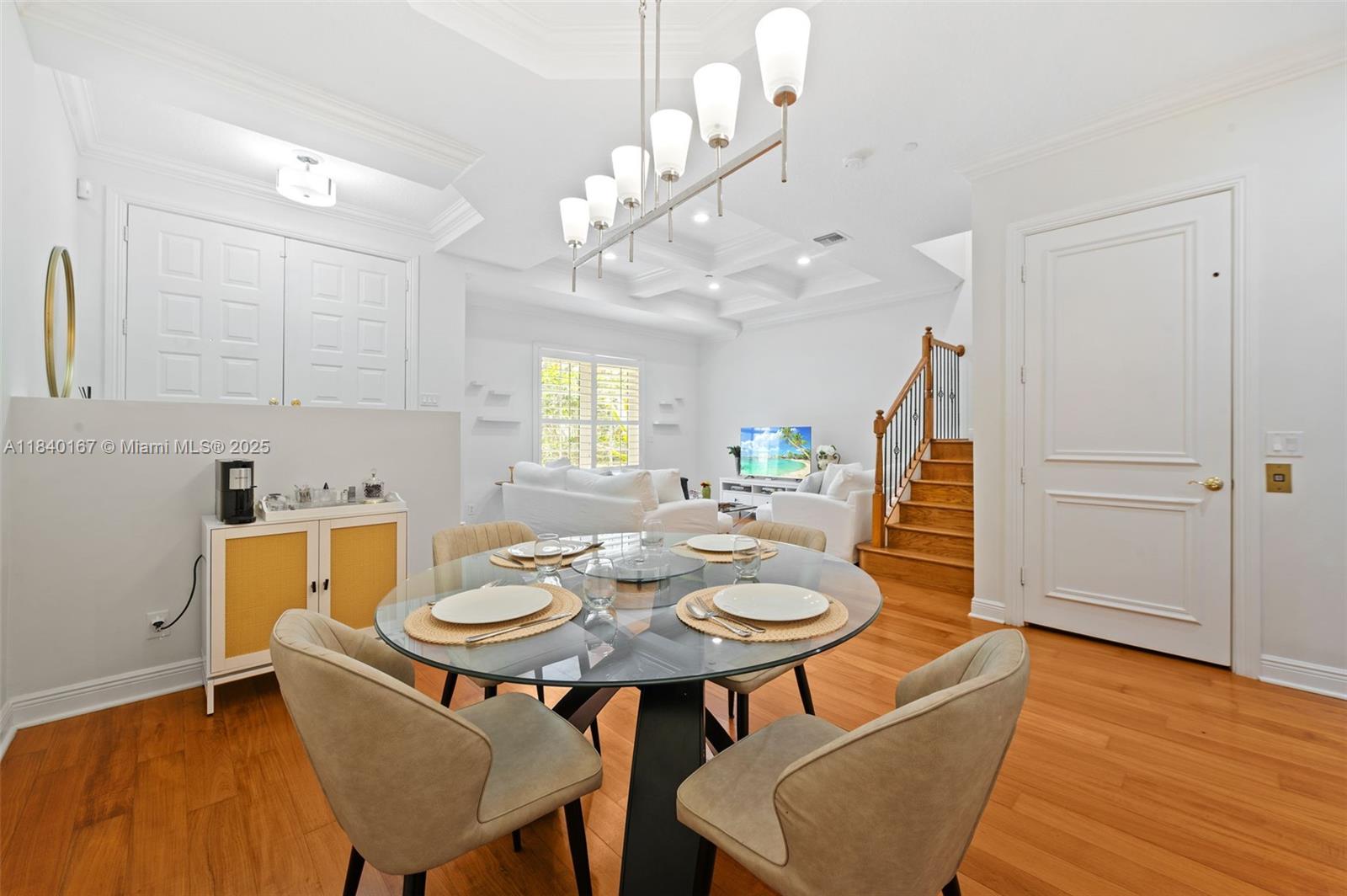 400 Northeast 69th Circle Boca Raton, FL 33487 - Photo 6 of 35 a view of a dining room with furniture and wooden floor