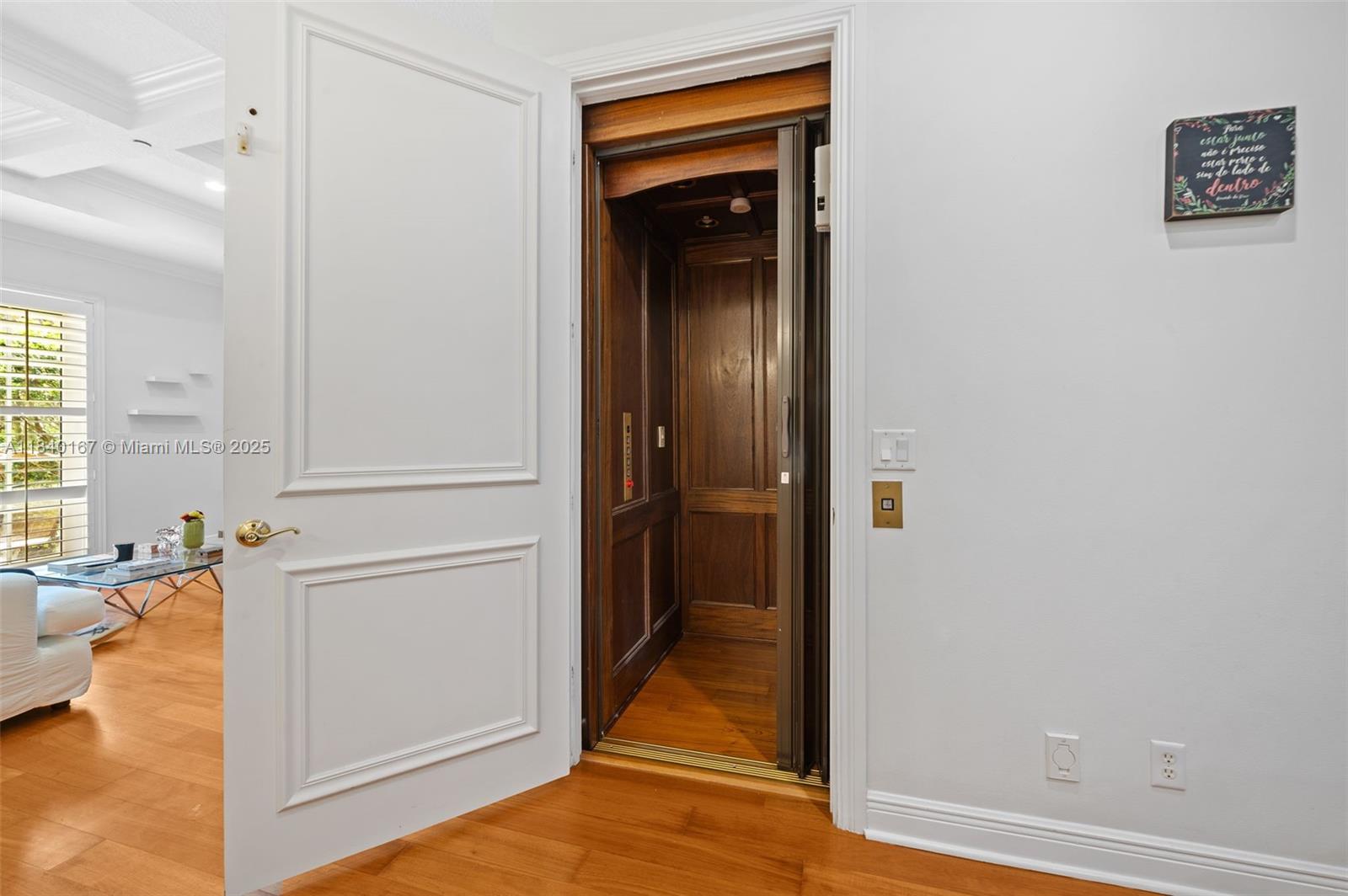 400 Northeast 69th Circle Boca Raton, FL 33487 - Photo 9 of 35 a view of a bedroom from the hallway
