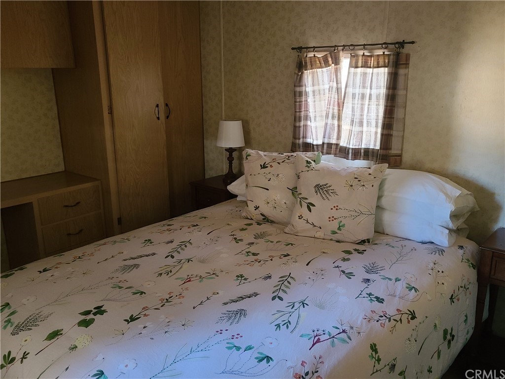 5925 Aluffo Road Paso Robles, CA 93446 - Photo 15 of 21 a large bed sitting in a bedroom next to a window