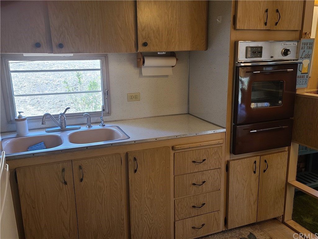 5925 Aluffo Road Paso Robles, CA 93446 - Photo 18 of 21 a bathroom with a sink and a mirror