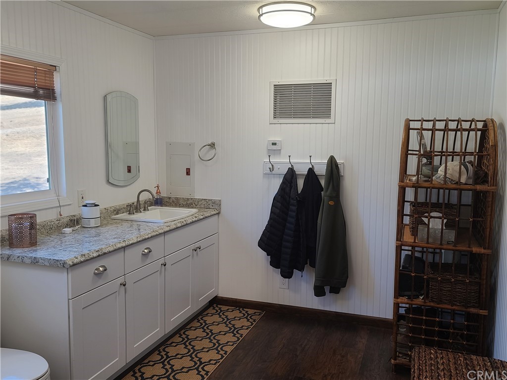5925 Aluffo Road Paso Robles, CA 93446 - Photo 6 of 21 a bathroom with a granite countertop sink a mirror and shower