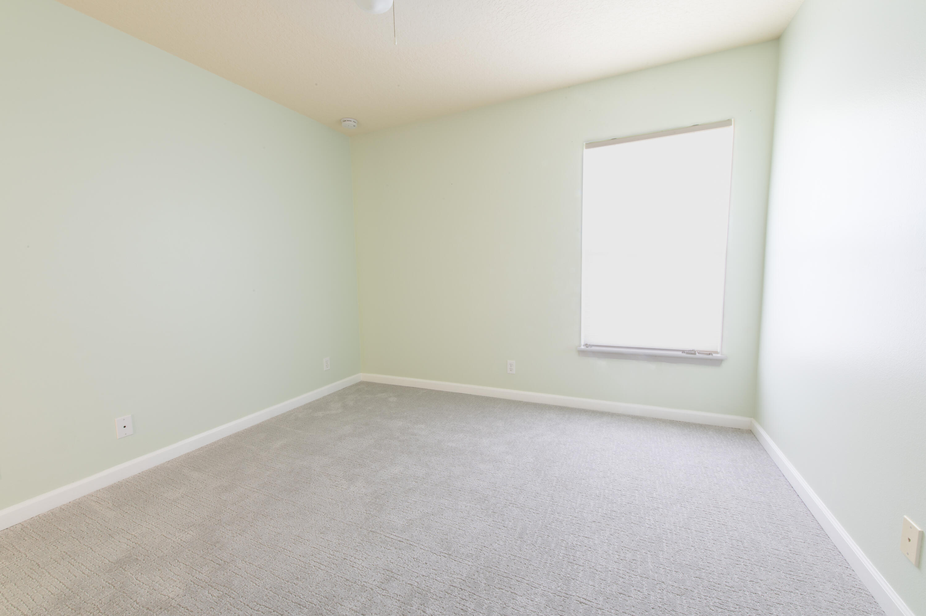 1470 Southwest Gadsan Avenue Port St. Lucie, FL 34953 - Photo 6 of 6 an empty room with a window