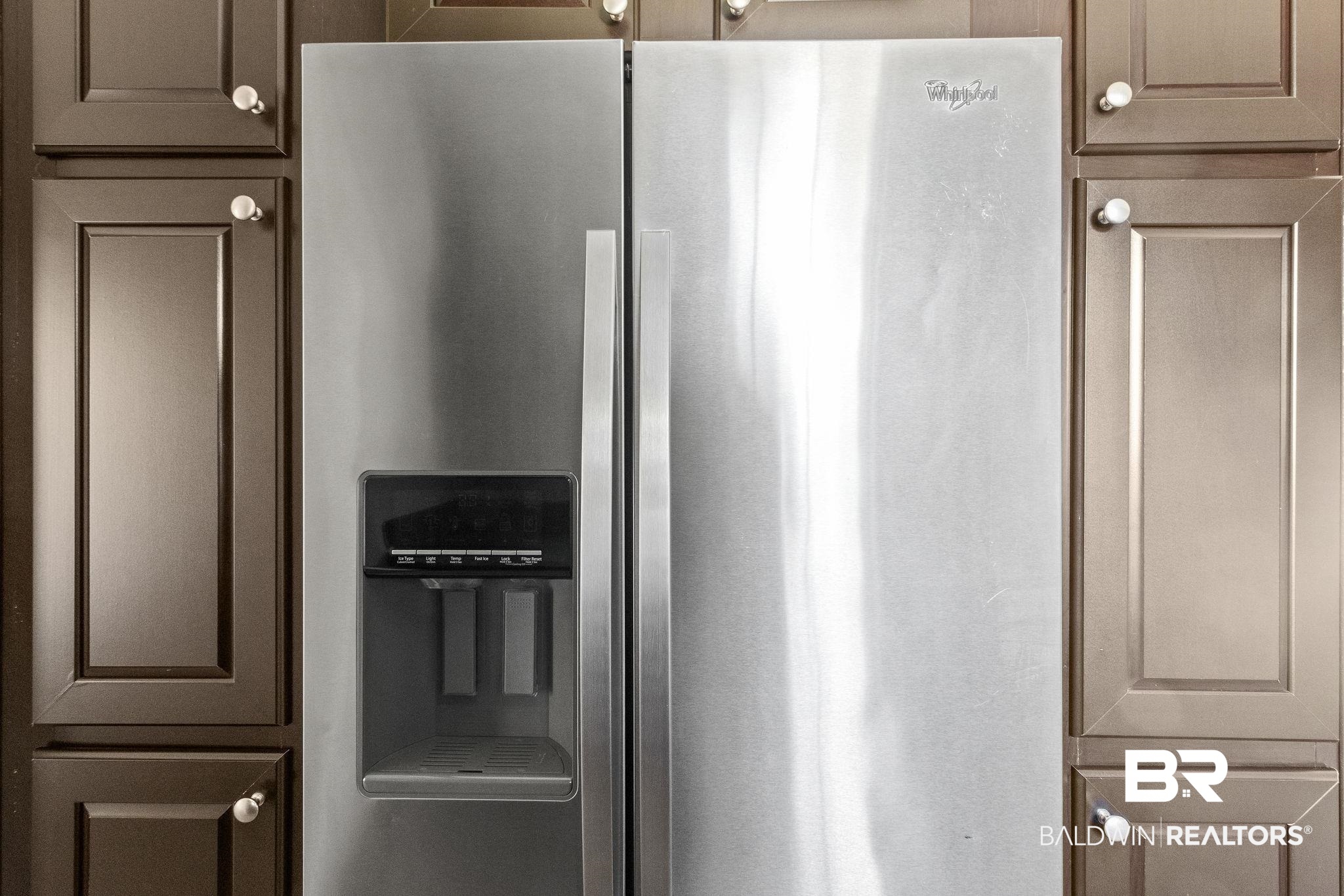 6870 Cecilia Court Theodore, AL 36582 - Photo 22 of 83 Details featuring stainless steel fridge with ice dispenser
