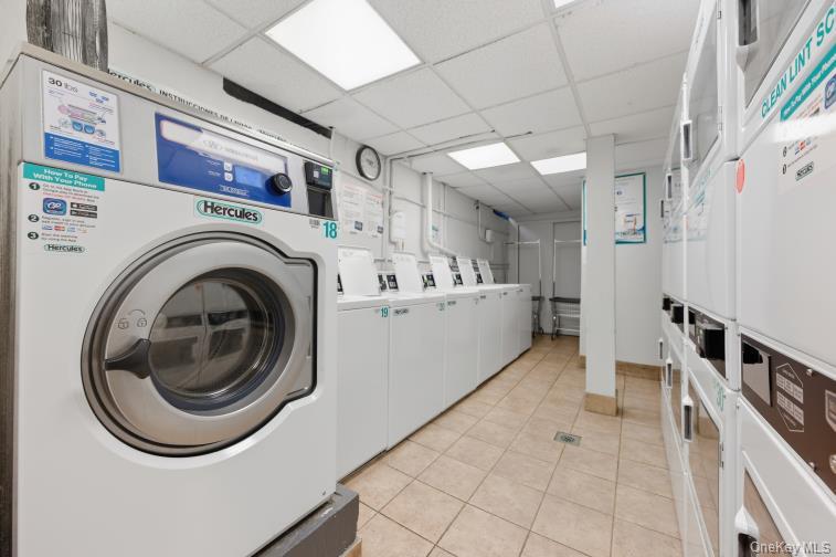 765 Bronx River Road, Unit 2I Bronxville, NY 10708 - Photo 10 of 13 a utility room with dryer and washer