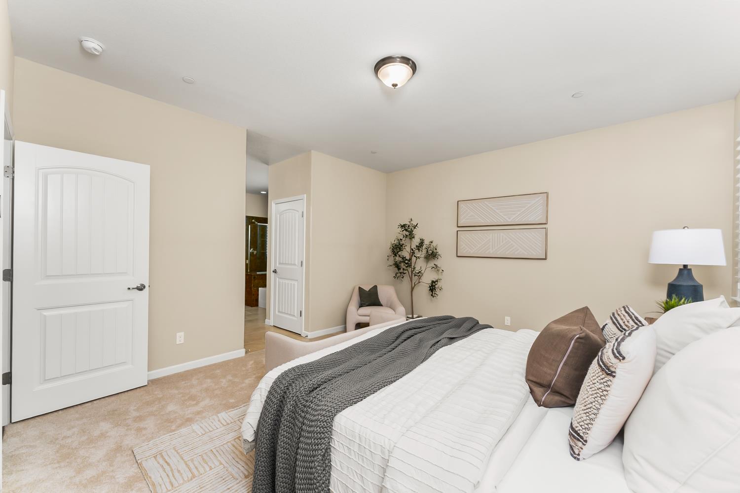 5453 Mossy Stone Way Rancho Cordova, CA 95742 - Photo 38 of 81 a bedroom with a bed and a painting on the wall