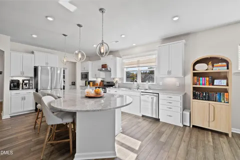 a kitchen with sink and window