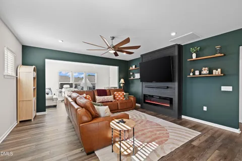 a living room with furniture and a table