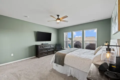 a bedroom with a bed and a closet