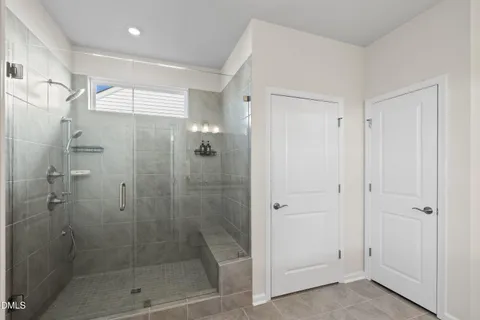 a view of a chairs and table in the patio