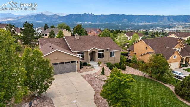 15110 Ridgefield Lane Colorado Springs, CO 80921 - Photo 2 of 50 Aerial front view with mountains in background, easy commute to Denver or Colorado Springs