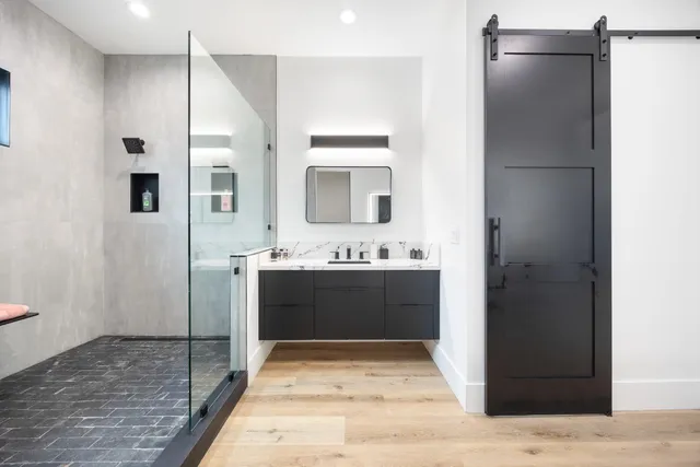 a bathroom with a sink and a mirror