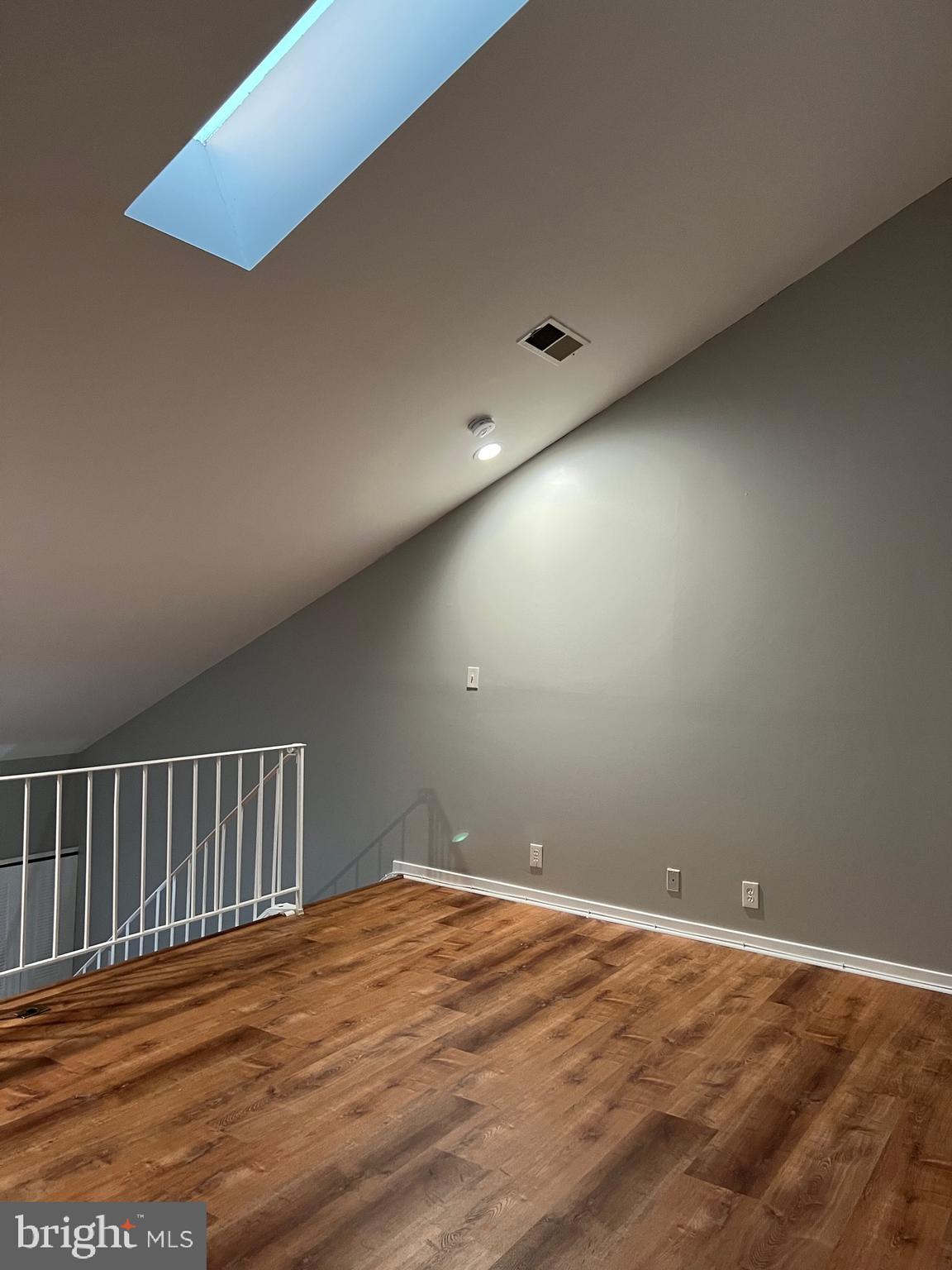 9916 Hellingly Place, Unit 154 Gaithersburg, MD 20886 - Photo 12 of 22 Bonus loft with hardwood floors and skylight