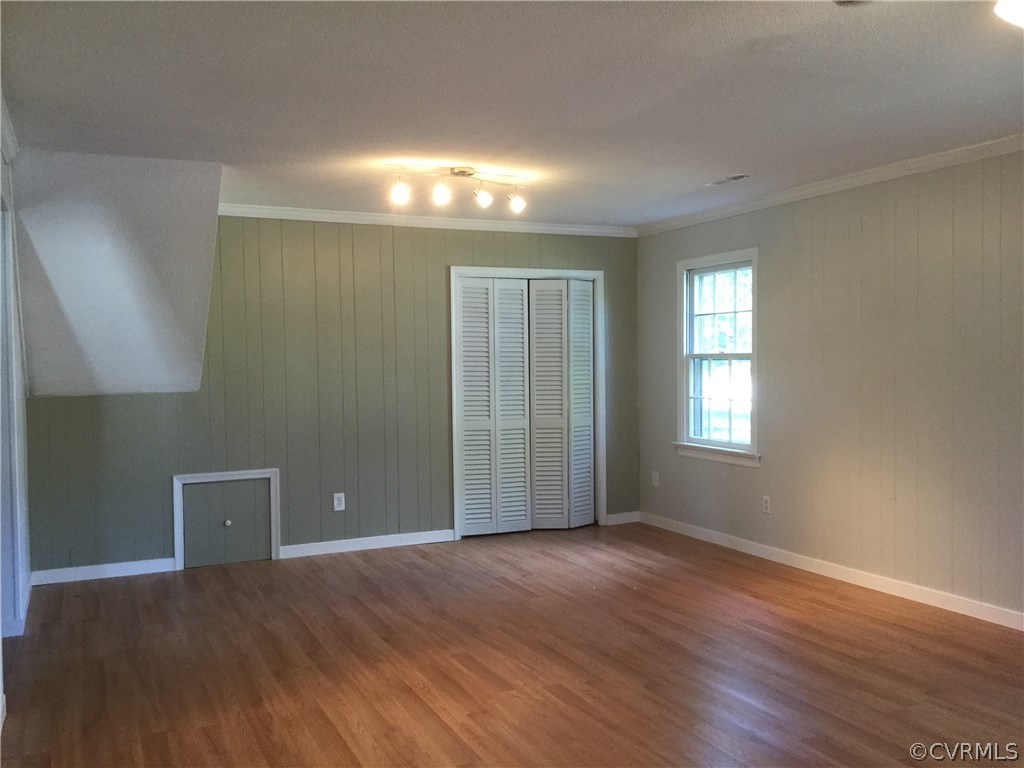 3701 Applewood Road North Chesterfield, VA 23234 - Photo 14 of 15 an empty room with wooden floor and windows