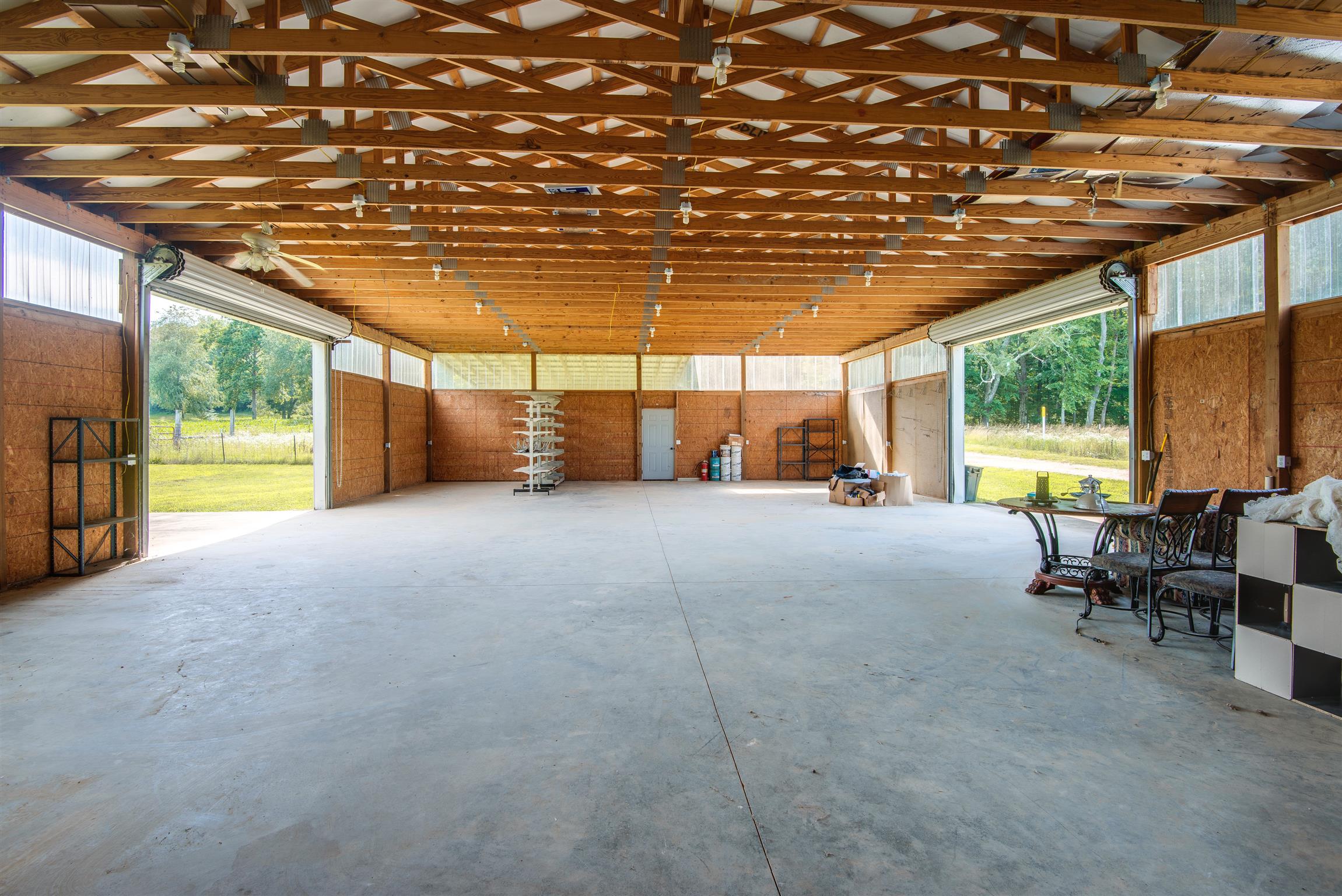 3198 Arnold Road Centerville, TN 37033 - Photo 15 of 30 Huge Metal Garage / Workshop w/ pair of industrial roll up garage doors -