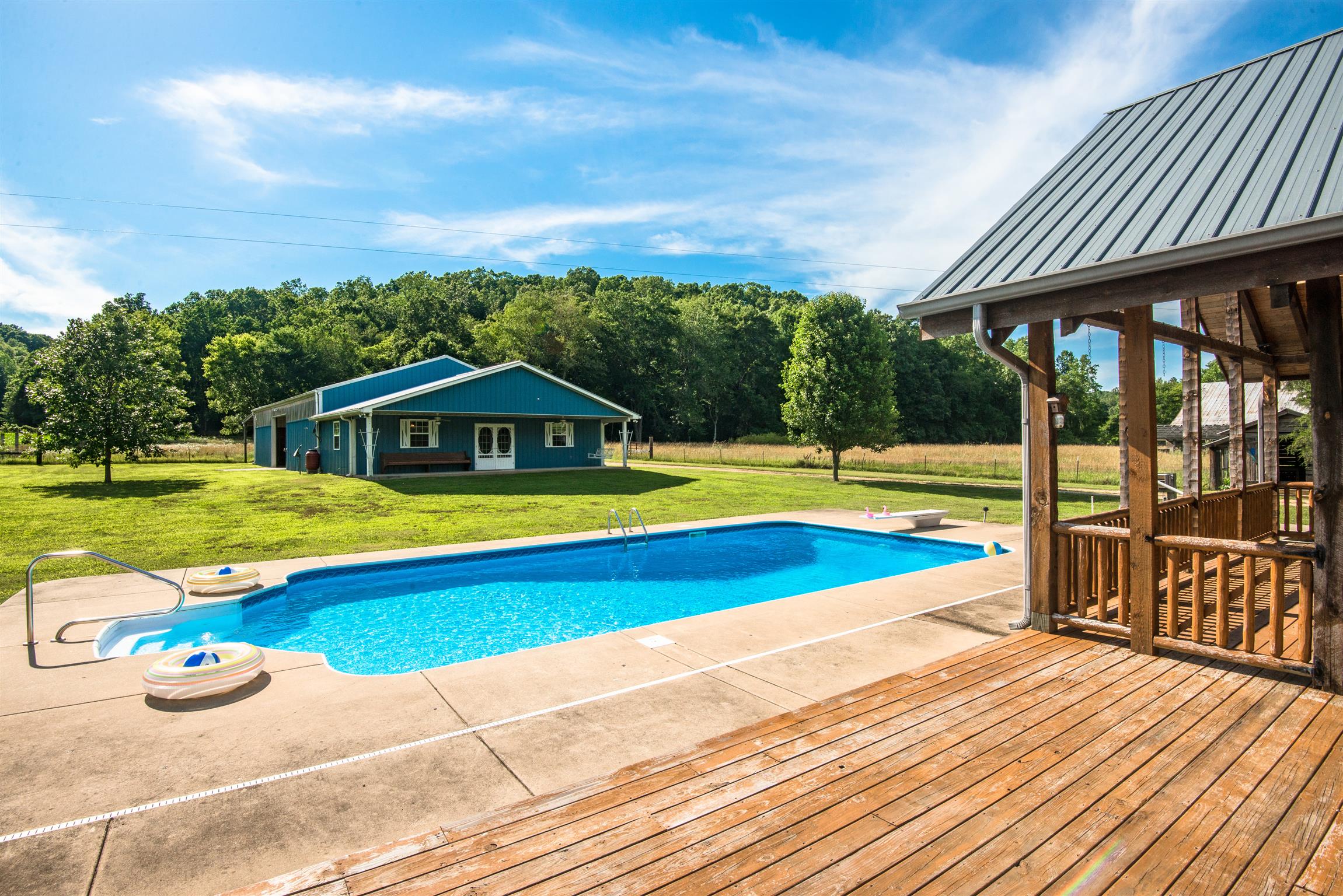3198 Arnold Road Centerville, TN 37033 - Photo 20 of 30 Pool deck w/ covered porch