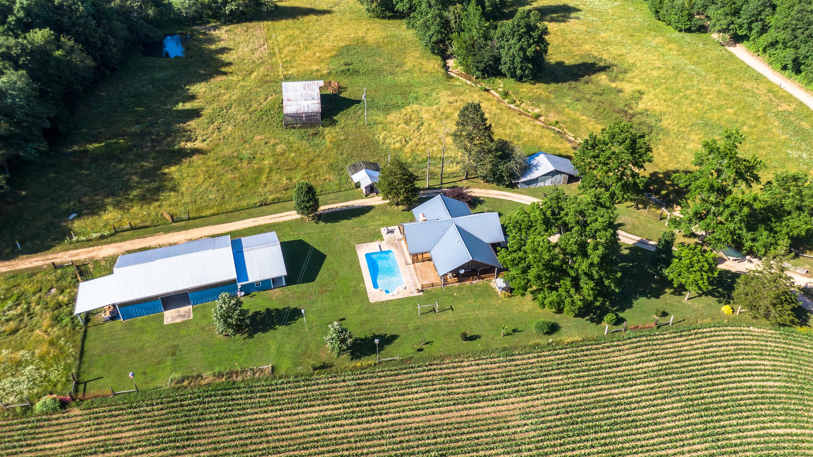 3198 Arnold Road Centerville, TN 37033 - Photo 28 of 30 Aerial view of home, pool, rustic barn, and guest house.