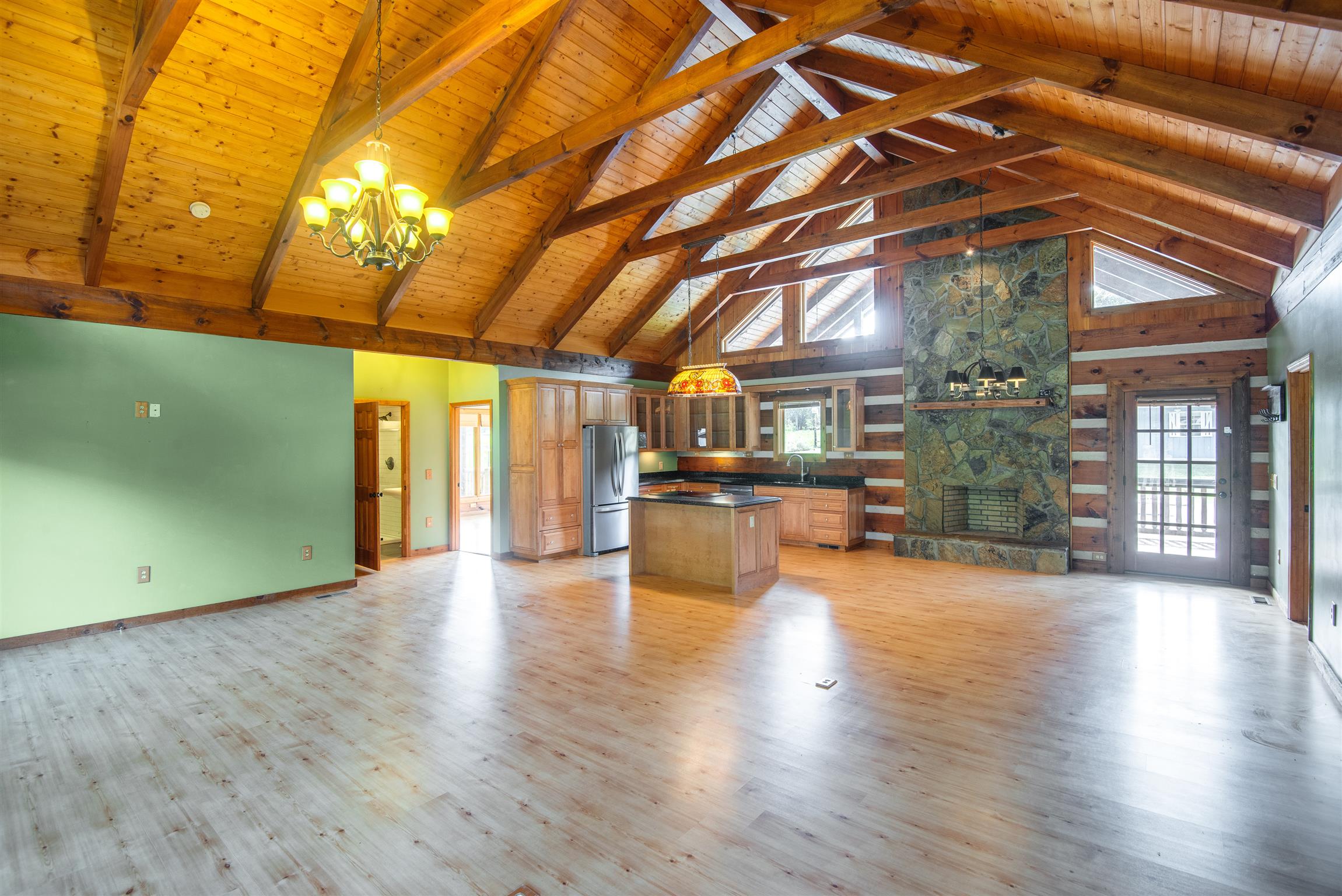 3198 Arnold Road Centerville, TN 37033 - Photo 30 of 30 Open floor plan with high vaulted ceilings and exposed wooden beams