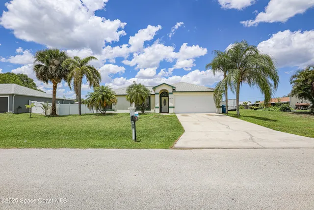 a view of backyard with green space