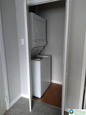a utility room with mirror