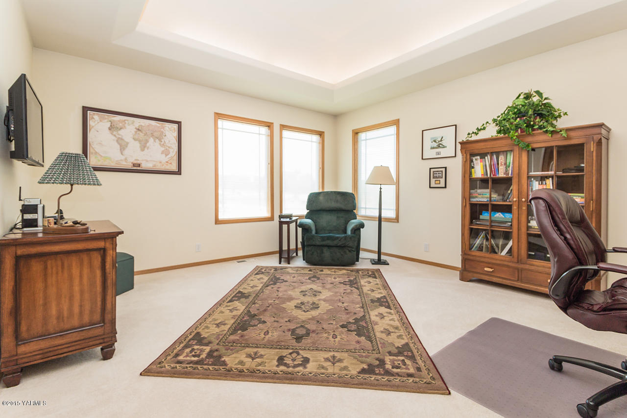 2971 Nelson Road Yakima, WA 98903 - Photo 13 of 43 a view of a bedroom with workspace and a window