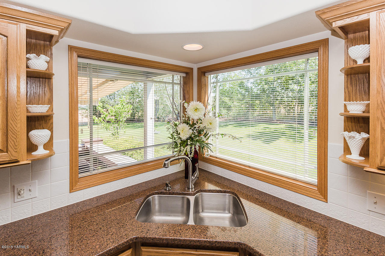 2971 Nelson Road Yakima, WA 98903 - Photo 7 of 43 a kitchen sink sitting next to a window
