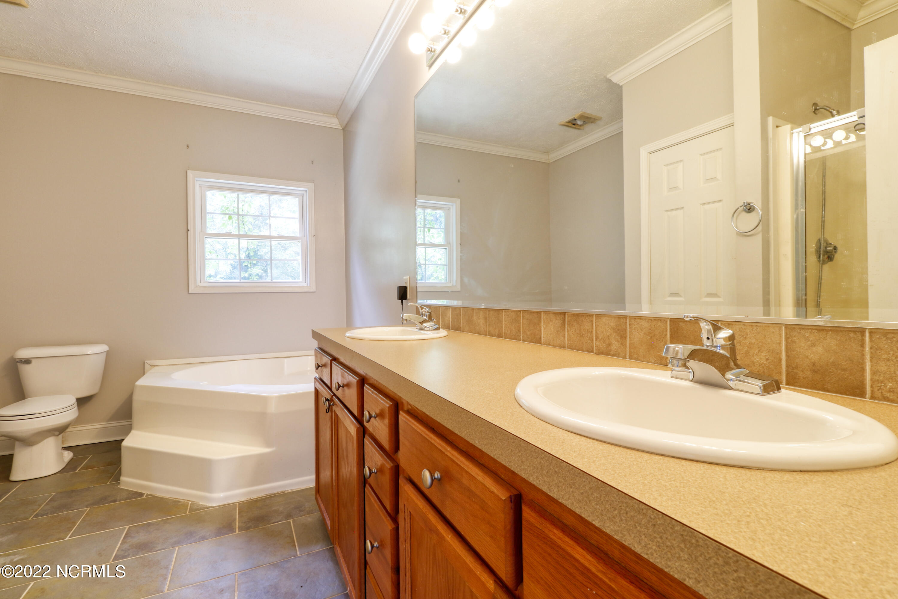 53 Arizona Trail Atkinson, NC 28421 - Photo 11 of 14 Master Bath features double vanity and soaking tub