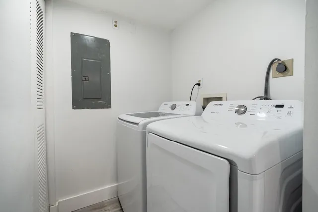 a utility room with dryer and washer