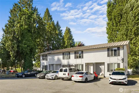 a car parked in front of a house