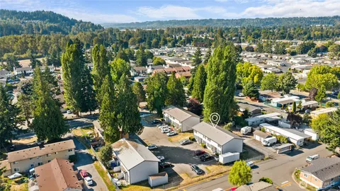 an aerial view of a city with lots of residential buildings