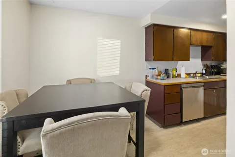 a utility room with a sink a washer and dryer