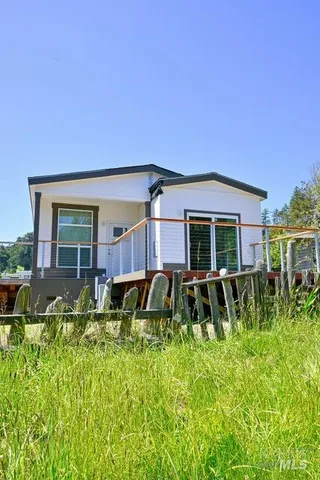 a view of a hardwood floor and a balcony