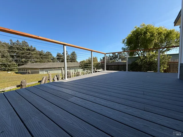 walk in closet with rug