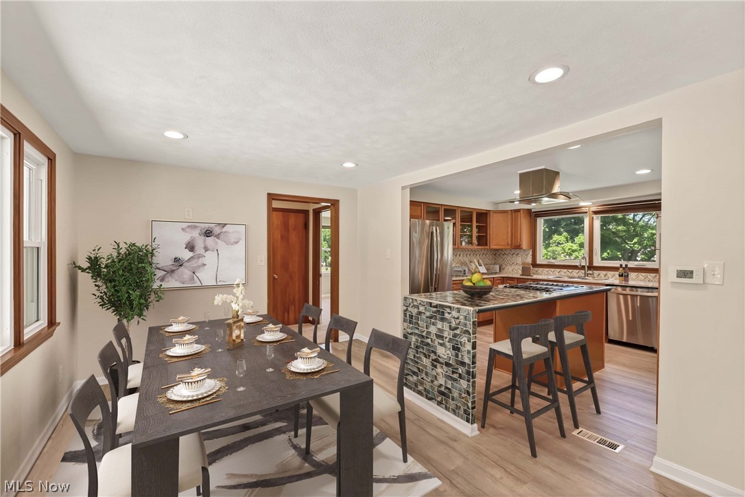 29514 Ridge Road Wickliffe, OH 44092 - Photo 4 of 49 Virtual Stage- Dining room featuring light hardwood / wood-style floors and sink