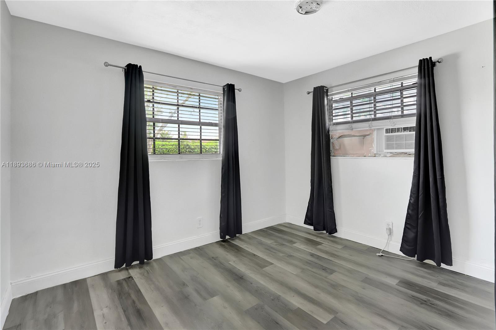 820 Northwest 67th Avenue Margate, FL 33063 - Photo 9 of 17 a view of empty room with front door