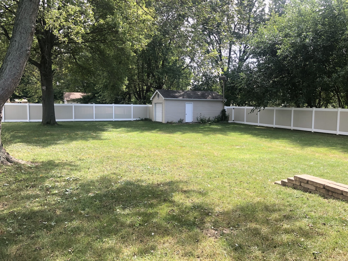 24848 South Ridge Road Elwood, IL 60421 - Photo 14 of 48 a view of a swimming pool and a yard
