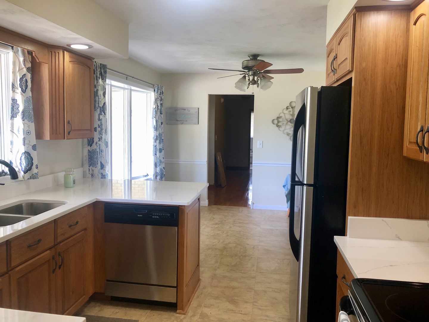 24848 South Ridge Road Elwood, IL 60421 - Photo 24 of 48 a kitchen with a refrigerator and a sink