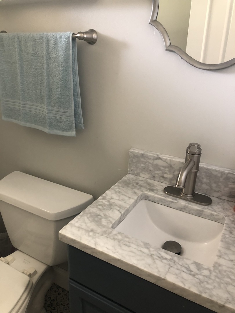 24848 South Ridge Road Elwood, IL 60421 - Photo 26 of 48 a bathroom with a sink and toilet