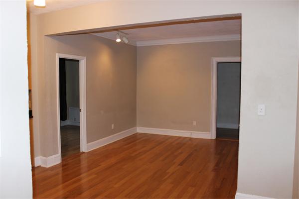 8 Chiswick Road, Unit 23 Boston, MA 02135 - Photo 12 of 15 an empty room with wooden floor and closet