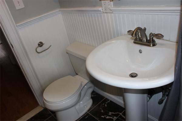 8 Chiswick Road, Unit 23 Boston, MA 02135 - Photo 8 of 15 a bathroom with a sink and a toilet