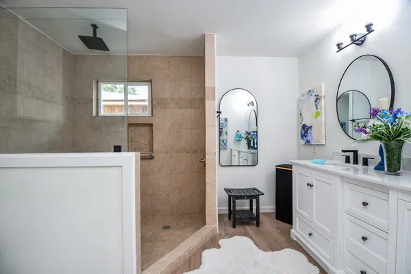 a bathroom with a sink and a mirror