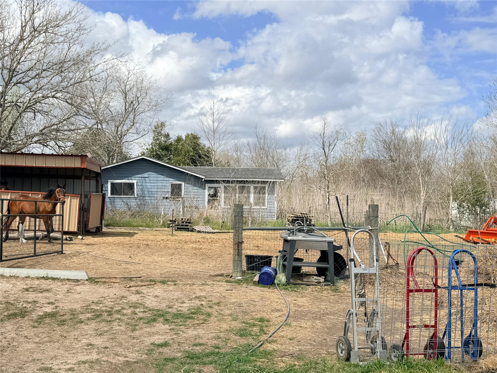 13700 Burnett Road Beasley, TX 77417 - Photo 22 of 38 a view of a house with cars in front of it